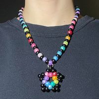 beaded necklace with kandi star charm + lobster claw clasp in back