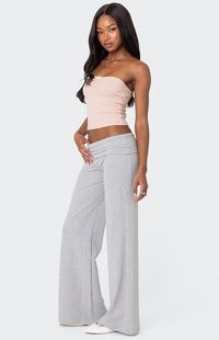 Online only! These Edikted Wide Leg Fold-Over Pants are the perfect choice for those days you want to feel comfortable while still looking put together. Rock it with a cardigan for the coolest y2k vibes.    	Pants 	Fold over waistband 	Wide leg fit 	Cotton, Spandex 	Model wears size S 	Model height is 5'9 	Item care: Machine wash at maximum 30C, do not bleach, tumble dry low, iron at a maximum of 110C, do not dry clean.