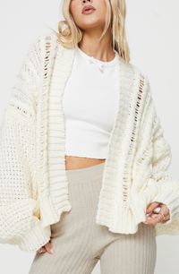 A slouchy fit and cozy open stitches add to the laid-back charm of this open-front cardigan trimmed with soft ribbing and perfect for topping off your look Open front Long sleeves Ribbed cuffs and hem 100% polyester Hand wash, dry flat Imported