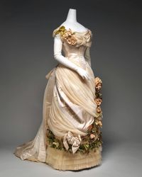 Anneliese on Instagram: "Shimmering satin; soft, yet structured drapery; fine net pleats and poofs; and a cascading garland of flowers and leaves - this is one of my favorite designs by Charles Frederick Worth 🎀 Evening Dress, ca. 1882, House of Worth. Metropolitan Museum of Art, 2009.300.635a, b. _______ #historicalfashion #houseofworth #charlesworth #couture #1880s #bustledress #silksatin #victorian #eveningdress #metmuseum"