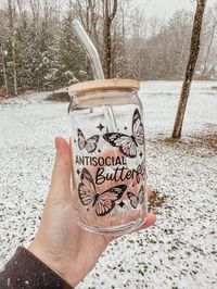 This trendy glass is the perfect vibe for you anti-social friends this holiday season! The glass pictured below is 16oz, but this glass is available in both 16oz and 20oz sizes. All of our cups are made with permanent/waterproof uv decals and come with a bamboo lid & reusable glass straw. All glasses are handwash only and come with care instructions in each package! This item is made to order and is not eligible for return. If you have any questions about your order, please reach out to us at bidwellbydesign@gmail.com.