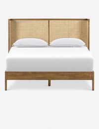 The Jeni Bed has a clean-lined wingback design for a timeless bedroom feel with its beautiful wood bed frame and cane paneled headboard. Shop this bed.