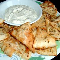 Garlic Pita Bread Bites=Healthy alternative to garlic bread. In addition, it's very easy to make Humus and Tatziki dipping sauces for the Pita chips. You'll want to shout Opaa and throw your dishes in the fire place!  LOL