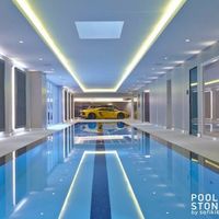 Outstanding Quality #PoolProject implemented in UK by Luxury Pools and Mosaics Ltd., An indoor pool decorated with #EastGrey #Marble coping and #KavalaMarble #trimmer and #decking