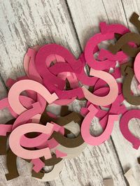 For this listing you will receive 100 assorted pink, brown and ivory hand punched horseshoe shape confetti on double sided acid free paper. horseshoes measure approximately 1 inch in size. If you would like this product in different colors please message me. I am more than happy to make custom requests but only if they are discussed before purchase. Please be sure to read our shop policies before purchasing. Thank you for your interest in my shop and for supporting my small business! take a full