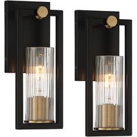 Blending hints of Art Deco, industrial, and contemporary style, this set of two modern wall sconces is the creation of Stiffel, exclusively for Lamps Plus. It features a rectangular wall plate echoed in an open frame, within which sits a clear, ribbed glass shade. A brass accent finish softens the look with warmth, creating a piece that instantly elevates surrounding decor.