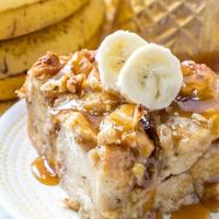 Warm, gooey and full of banana bread flavor this Banana Bread Pudding is a fun and easy breakfast or dessert treat that is hard to resist! #bananabread #banana #breadpudding #breakfast #tasty #caramel #caramelsauce