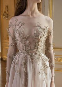 Strapless fairytale pale rose wedding gown with leafy motifs reminiscent of creeping ivy // We’re lost in reverie looking at Paolo Sebastian’s 2017-2018 Autumn/Winter “Reverie” collection which features a rich colour palette, juxtaposition of textures and ornate accents with an emphasis on leaf and floral motifs.