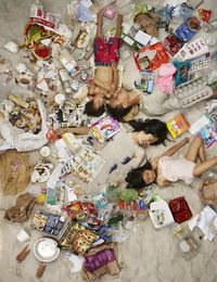 ’7 Days of Garbage’, A Thought-Provoking Photo Series That Shows People Laying In a Week’s Worth of Their Own Trash