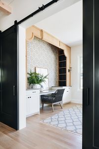 Bookcase Design The bookcase was custom designed by the interior designer and it was once created to surround a kitchen hood. I love the fact this design was reinvented for this space As you can see here, the bookcase features open yet hidden shelves #Bookcase