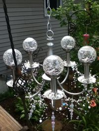 From Trash to Treasure~ Solar light Chandelier~I've made several of these for gifts~Beautiful Night & Day!