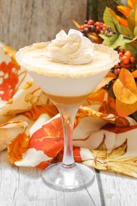 Thanksgiving dessert in a glass! This pumpkin pie martini is a decadent fall cocktail that tastes just like the real thing — and it looks beautiful too!