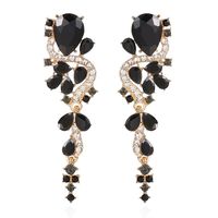 PRICES MAY VARY. ❤High Quality Material❤:The large sparkly statement earrings made from crystal,rhinestone and gold plated.they are nickle free,lead free,hypoallergenic and comfortable. ❤Long Black Rhinestone Bridal Teardrop Earrings Size❤: 2.5 inch X 0.7 inch X 6 g. ❤Unique Design❤:These big crystal statement chandelier earrings looks very gorgeous and sparkly.Unique sophisticated chandelier design can be matched with different outfits,complement different looks and make you stand out from the