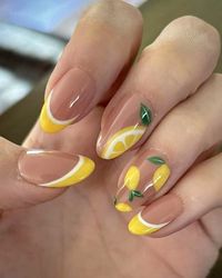 Bethany (Bee 🐝) | Luxury Press On Nail Artist on Instagram: "Love to see Ellen loving her latest set !! And they’re giving off summer vibes already!  🍋Who is on board with the lemon trend this season?  These are just SO cute 🤩   Short Round Après nails and that perfect glossy shine - you already know it’s @by.chloenails glossy top coat  #lemons #lemonnails #citrus #citrusnails #lemonnailart #fruitnails #fruitnailart #lemonnails🍋 #shortnails #frenchtips #doublefrench #yellownails #shortnailart #yellownailart #nails #pressons #presson #pressonnails #pressonnailsforsale #nailsnailsnails #nailsofinstagram #nailart #spring #springnails #springnailart #springnaildesign #seasonalnails #beeimpressednails #tpa #thepressoncollective"