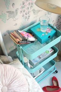 Small space saver - grab a caddy on wheels to use as a makeshift nightstand, side table or desk buddy.