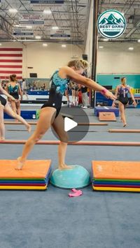 Best Darn Gymnastics on Instagram: "Beam landing drill - This comes from the Kristen Harold (TWU) at the  Best Darn College Camp.  The BOSU Ball helps the athlete work the stability of their first leg down on their landings.  Using a slightly unstable surface means that the gymnast must compensate and find their balance and control more.   We hope this helps you and your athletes create their Best Darn Gymnastics!   #bestdarngymnastics #gymnastics #coaching #education #gymnasticsdrills #beam #landings #stability"