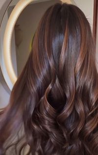 Bask in the warm glow of sunkissed brunette locks, a natural masterpiece illuminated by the sun's gentle touch. Find inspiration for radiant beauty on Pinterest.