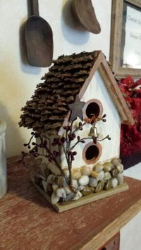 Stone & pinecone birdhouse