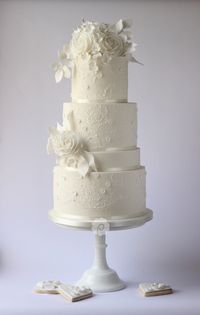 White wedding cake with brushwork details