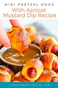 An easy apricot mustard dip takes these homemade Mini Pretzel Dogs over-the-top. These tasty morsels will be a hit at any party.