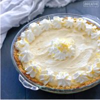 Lemony and sweet, this refreshing low carb lemon pie recipe is easy to make and perfect for any summer party! Keto, Atkins, Sugar Free, and Gluten Free!