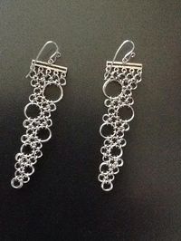 Showstopper earrings made with jumprings. https://www.craftsupplydepot.com/jewelryFindings/misc01.asp