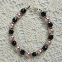 Light Pink Glass Pearls With Black Faceted Czech Glass And Antiqued Silver Tone Bead Caps. The Glass Beads And Caps Were All Salvaged From An Antique Broken Flapper Necklace. The Glass Pearls And Clasp Are New. Measures 7 3/4". Handmade One Of A Kind. Questions And Offers Are Welcomed:)