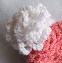 Learn how to make a Super Easy chained Pom Pom that matches a Valentine's Hat!