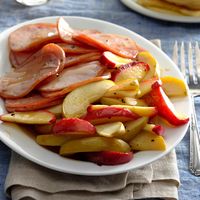 Canadian Bacon with Apples Recipe -When the holidays roll around, I'd rather spend time with family and friends than be stuck in the kitchen. So I've come to rely on easy-to-fix recipes like this. No one can resist Canadian bacon and apples coated with a brown sugar glaze. —Paula Marchesi, Lenhartsville, Pennsylvania