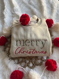 Celebrate Christmas this year with this super cozy and soft sweatshirt featuring a Christmas floral design. This sweatshirt is fleece lined to keep you warm and comfortable. Colors can be changed upon request- please list in personalization box.  7 colors are available: 🎄Black 🎄White 🎄Navy 🎄Heather Gray 🎄Pink 🎄Sand 🎄Military Green If there is a color you have in mind other than the ones available, send me a message and I can help! -Sweatshirt brand: Gildan -Sizes available: Adult Small -