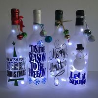 We wish you a Merry Christmas. Lighted wine bottle with cut vinyl. Frosted wine bottle has 30 white LED wire lights inside. This is fairy lights, NOT cheap holiday lights. Bottle is SEALED with regular PVC wine seal, just like any unopened wine bottle! My Christmas bottles have an extra