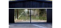 sliding glass doors can slide over the external faces of barn walls for a fully open aperture where large cart doors used to be