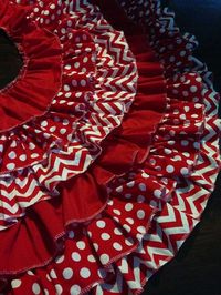 I LOVE THIS!! Alex and myself's first Christmas as husband and wife, we're getting a custom tree skirt made!! :) Ruffle Christmas Tree Skirt Red Chevron