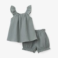 Good for baby, good for the environment. Our organic, naturally sustainable muslin is soft and breathable, ideal for outdoor adventures during the spring and summertime. Cast in a dreamy palette and adorned with coconut shell buttons, these everyday essentials combine fashion and function for the modern child