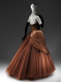 Charles James | "Swan" | The skirt’s six layers, composed of 1,080 square feet of tulle, are combined in various colors to give it depth and luminosity. Despite its ethereal appearance, it is, at twelve pounds, the weightiest of his grand creations.