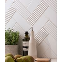 This unique and innovative range was developed exclusively by Topps Tiles, taking inspiration from the growing interior trend for fluted glass and textured homewares. A visual and tactile delight, Flute’s reeded 3D structure decor tile is reminiscent of the glamourous art deco era whilst its contemporary muted colour palette brings a modern edge. Its inimitable ultra matt finish feels as soft as suede both on the riven decor and complementary plain tile. Due to the unique Ultra Matt finish to ou