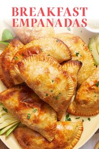 These Breakfast Empanadas are made with a buttery, flaky dough and have a filling of chorizo, potato, eggs, spices, peppers, and cheese! They make a great on-the-go breakfast recipe and can be made ahead of time. #empanadas #breakfastempanadas