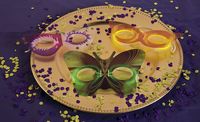 Light up the night in a whole new way with these glowing Mardi Gras masquerade masks.