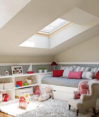 Children's room. Great use of low space with a fabulous sky light!