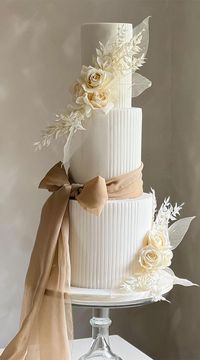 Elegant Bliss Wedding Cake Ideas : Nude Bow and Roses Wedding Cake