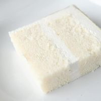 WASC cake or "white almond sour cream cake" has been used for years and adapted many times and is an easy way to make a box cake taste more like scratch.