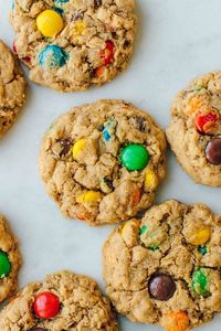 The best soft, chewy and thick MONSTER COOKIES. Super easy to make and loaded with oatmeal, peanut butter, M&M's and chocolate chips.