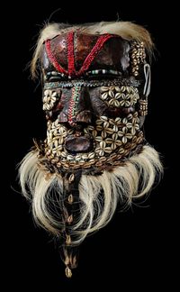 Africa | Helmet mask "bwoom" from the Kuba people of DR Congo | wood, copper sheet, polychrome glass beads, cowrie shells and animal hair