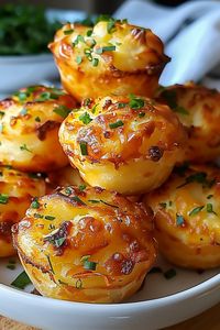 Oven-fresh Cheesy Mashed Potato Puffs on a cooling rack