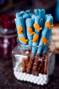 Nautical birthday party decorated pretzel rods! See more party planning ideas at CatchMyParty.com!