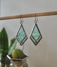 These beautiful Stained Glass Earrings are handcrafted in Dulwich Hill, Sydney. Geometric but elegant and unique pieces to add to your collection.  Originally designed by PidegoArt, this simple design goes well with an elegant dress as well as a casual outfit. You can wear them every day and will not get tired of them! Freshly made stained glass solders are shiny but as you wear them, it will be dull. You can polish them or enjoy antique look.  925 Sterling Silver hooks, Earring heads are made u