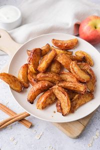 Want to make air fryer apple slices? Made from just a few simple ingredients, these delicious apples make a sweet snack or topping!