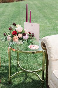 Mid century modern vintage brass + glass side table to style in your romantic garden party wedding design. Rent side tables at Orange Trunk Vintage Rental in Rocky Mountain Area + Calgary, Alberta, Canada.