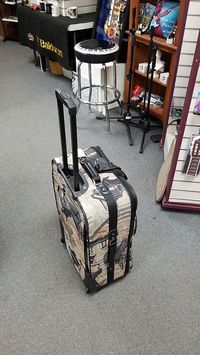 perfect gift and travel companion for the musician. Now your suitcase will be easy to spot on the luggage pickup at airports. Be as unique as your musicianship.25x15x8