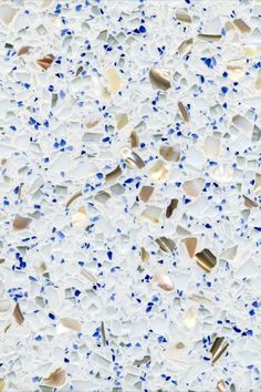 an image of glass with blue and white speckles